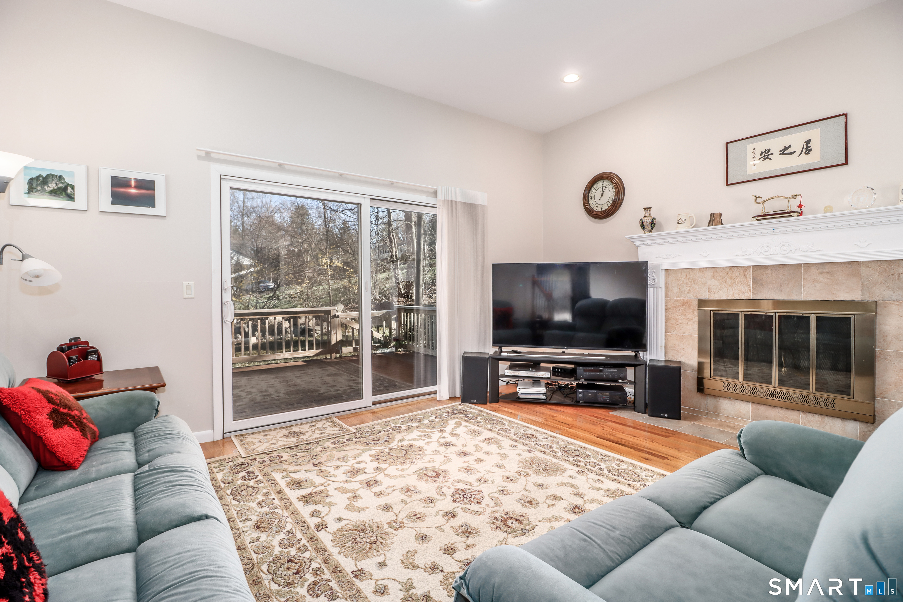 35 East Gate Road Danbury, CT 06811 - Photo 12 of 37 a living room with furniture and a flat screen tv