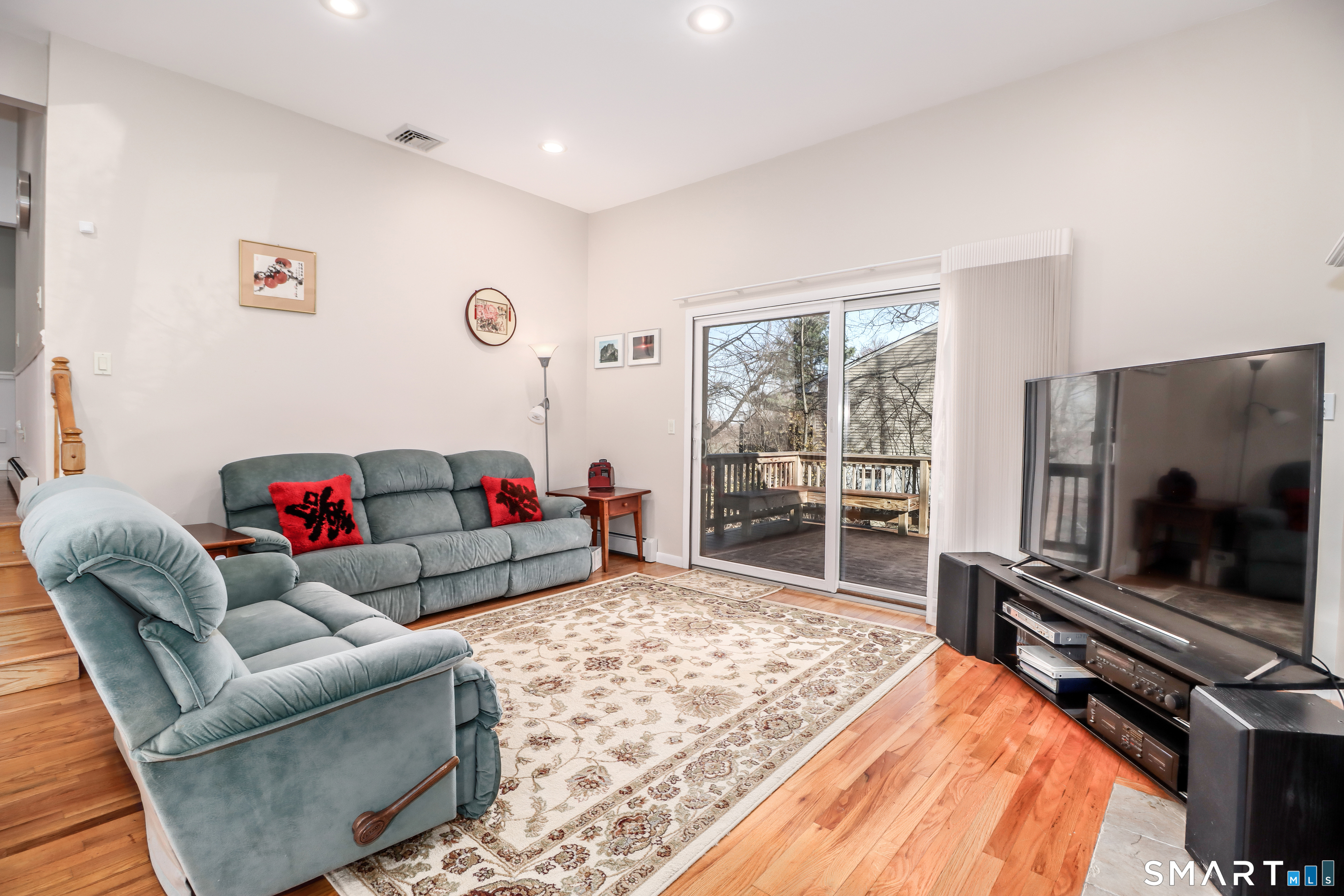 35 East Gate Road Danbury, CT 06811 - Photo 13 of 37 a living room with furniture and a flat screen tv