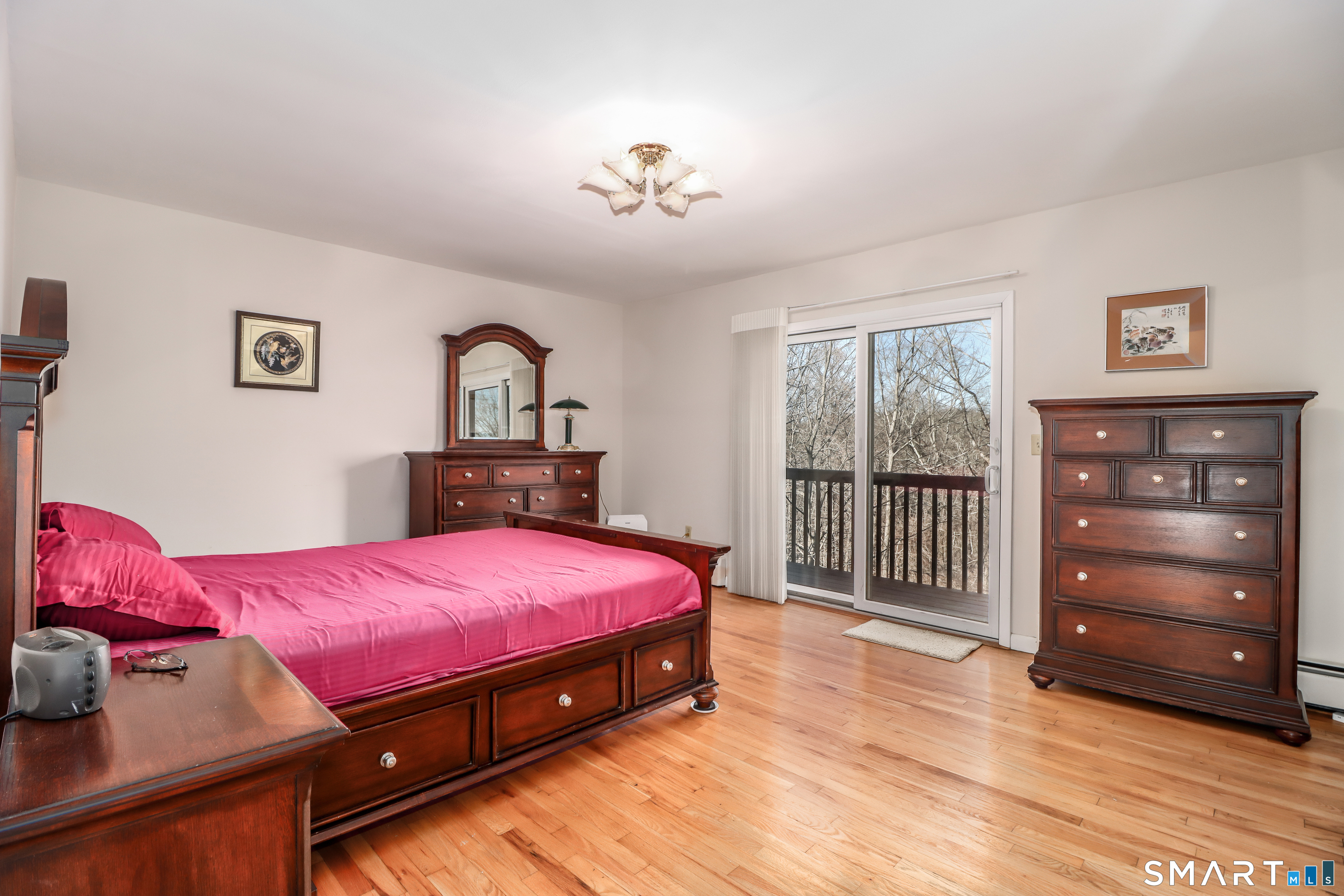 35 East Gate Road Danbury, CT 06811 - Photo 16 of 37 a bedroom with a bed and a dresser