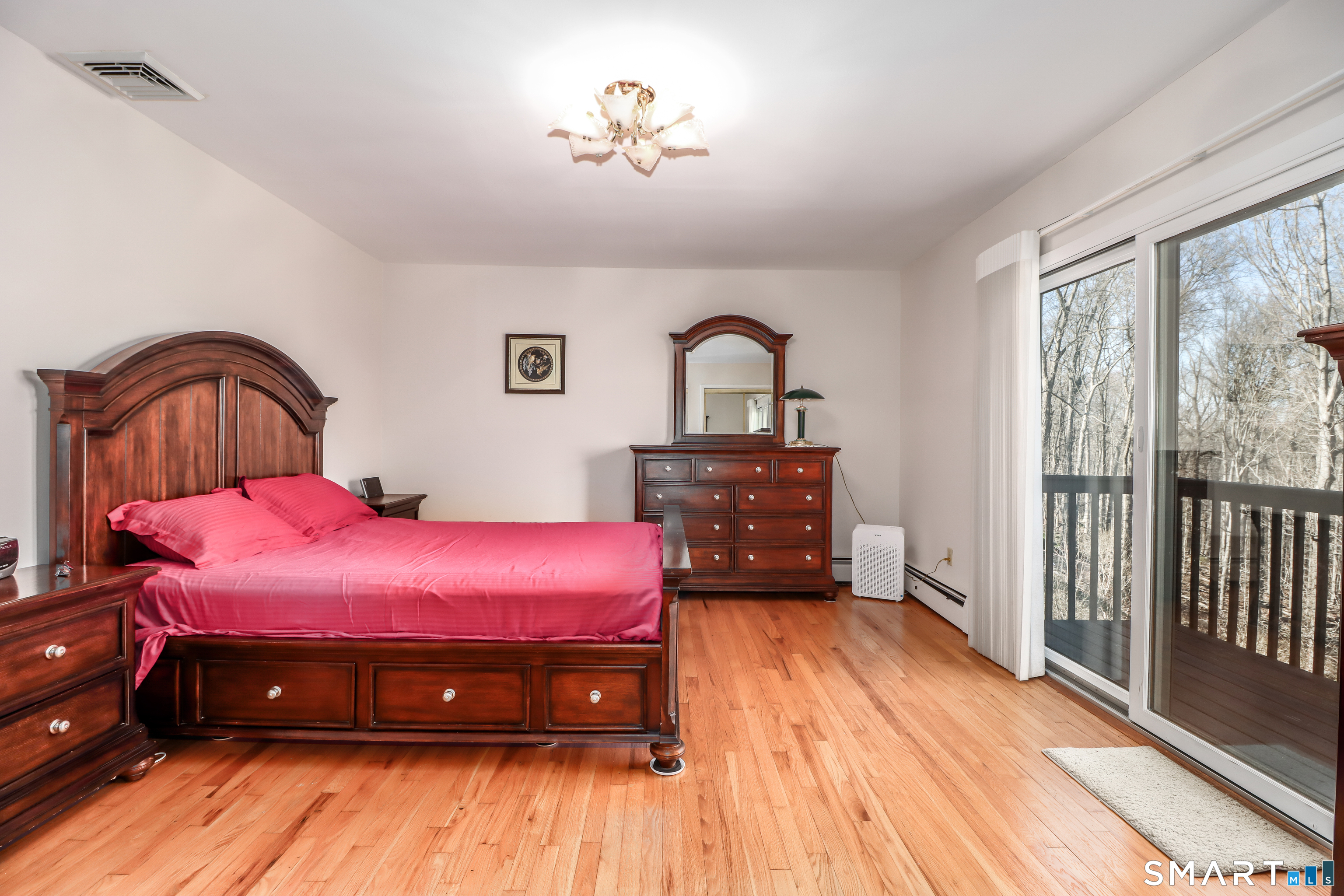 35 East Gate Road Danbury, CT 06811 - Photo 17 of 37 a bedroom with a bed and a dresser