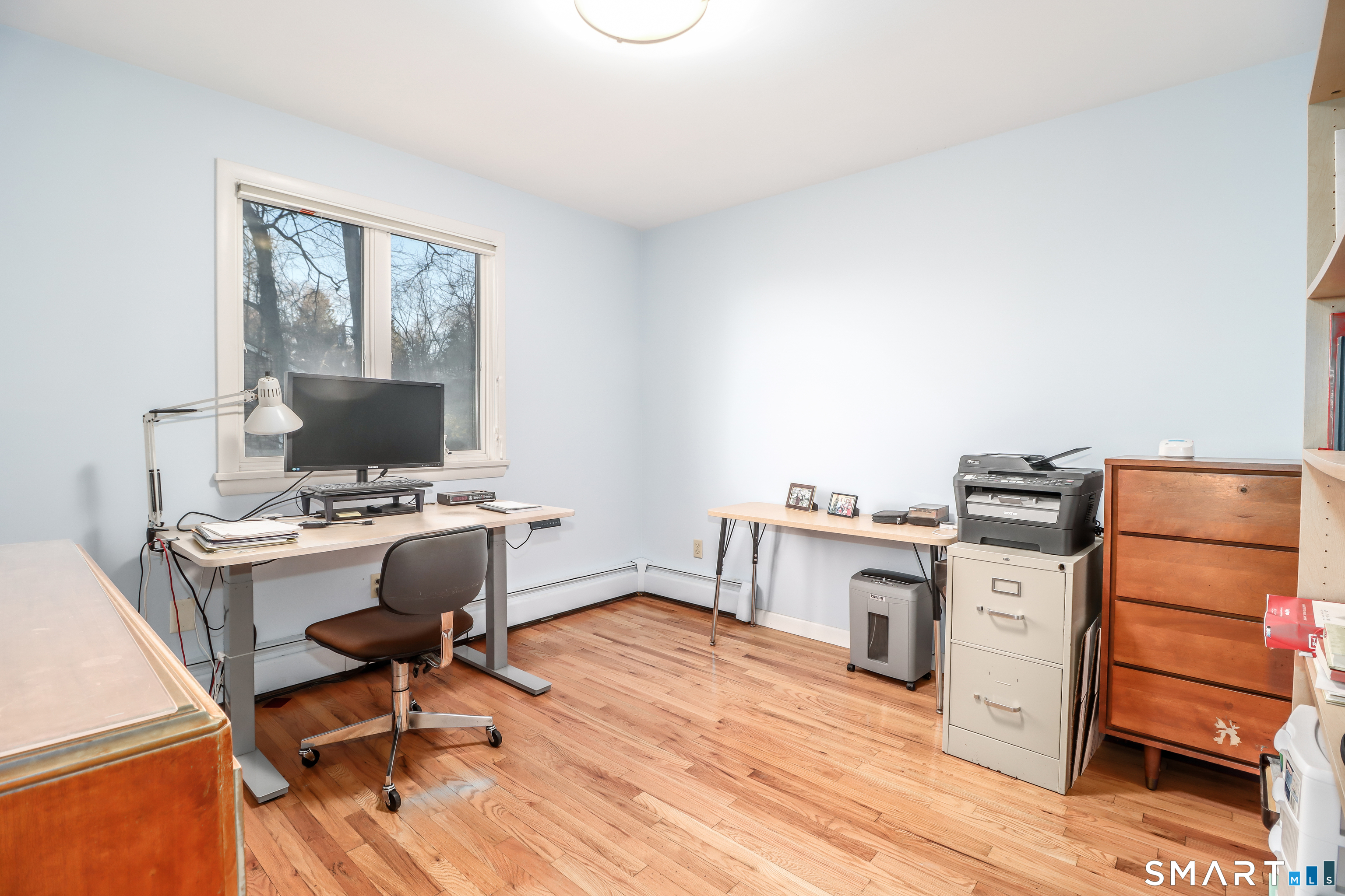35 East Gate Road Danbury, CT 06811 - Photo 22 of 37 a view of workspace with wooden floor windows cabinet