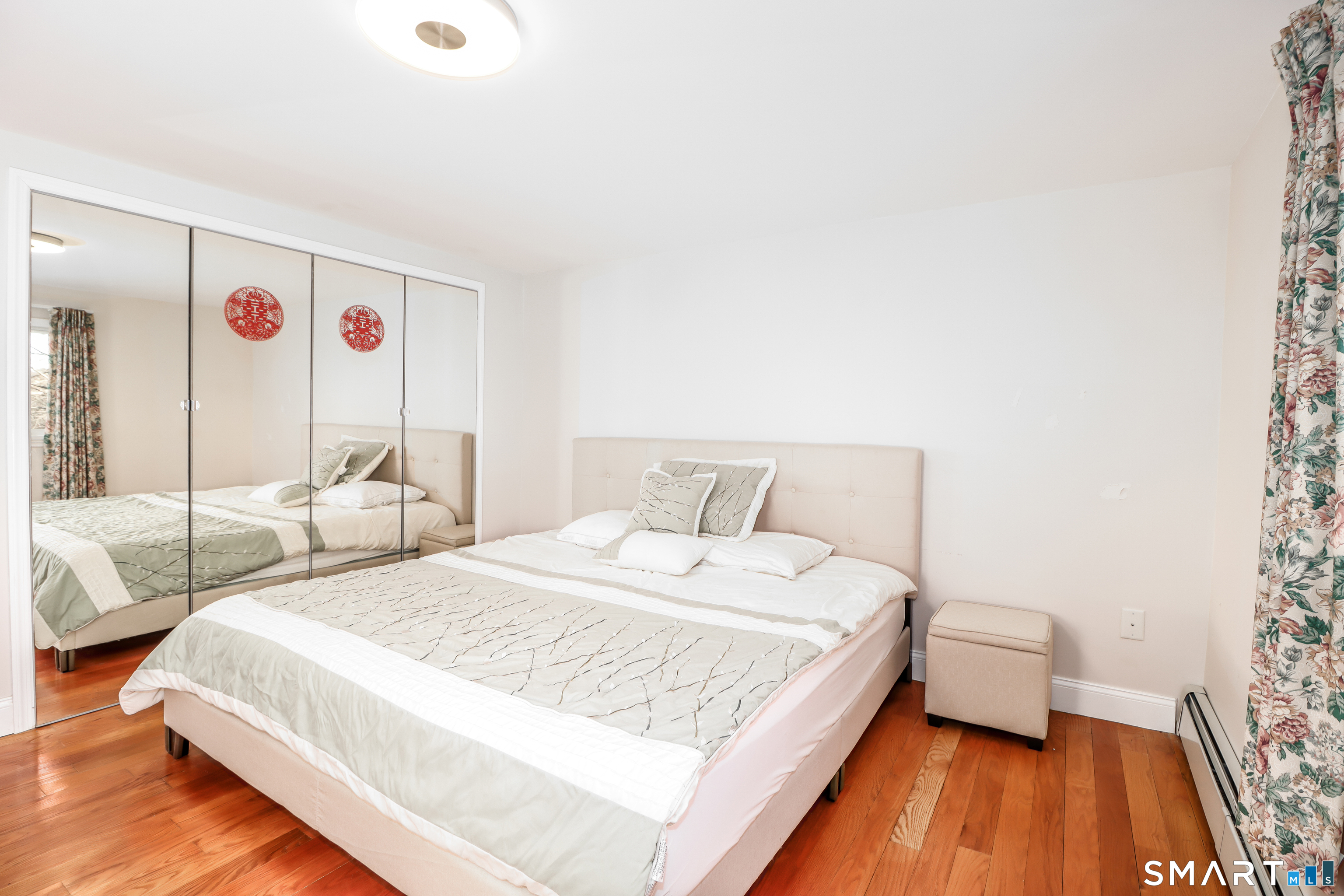 35 East Gate Road Danbury, CT 06811 - Photo 24 of 37 a bed room with a bed and a couch