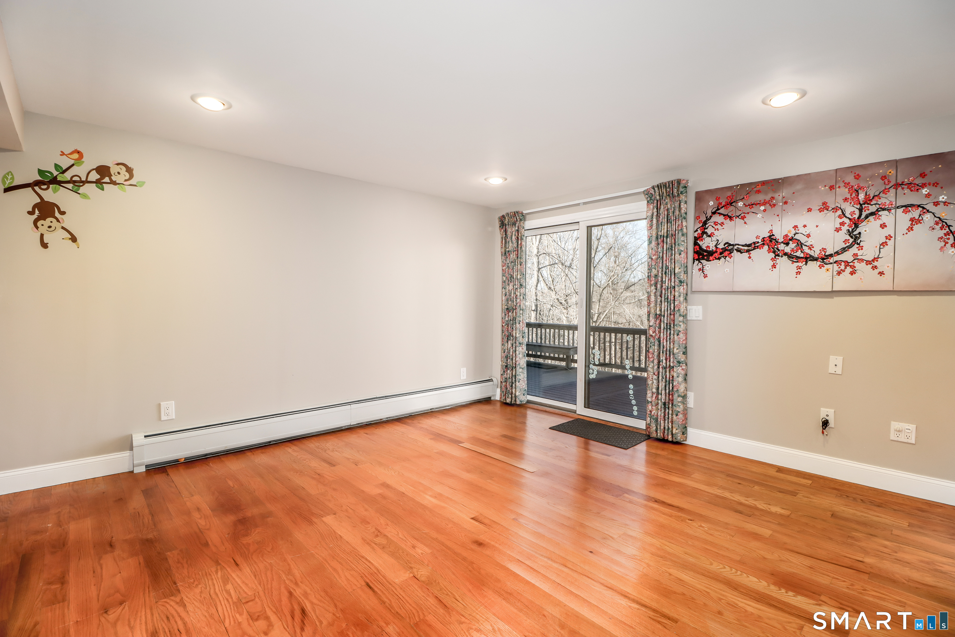 35 East Gate Road Danbury, CT 06811 - Photo 30 of 37 wooden floor in an empty room with a window