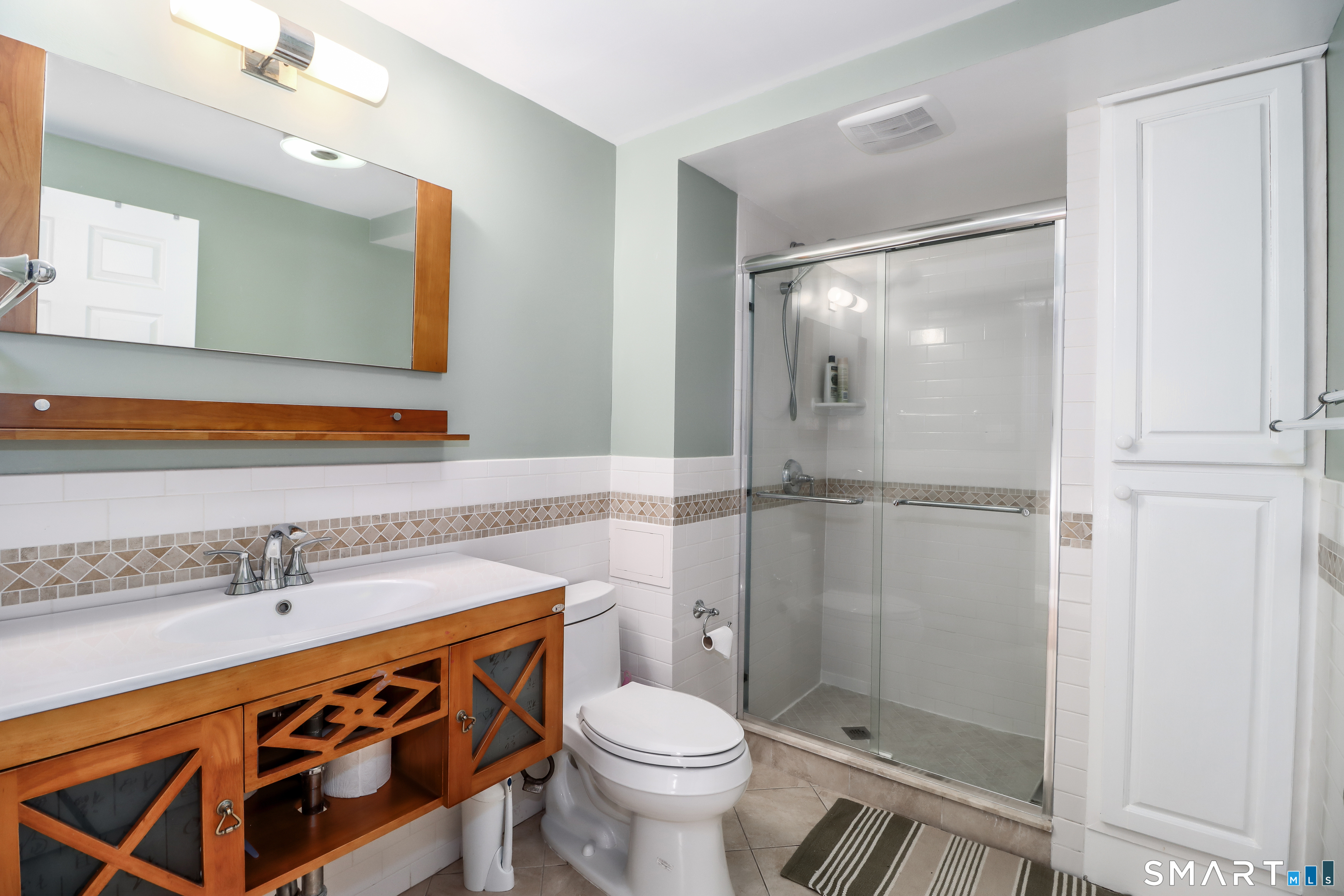 35 East Gate Road Danbury, CT 06811 - Photo 31 of 37 a bathroom with a sink and toilet