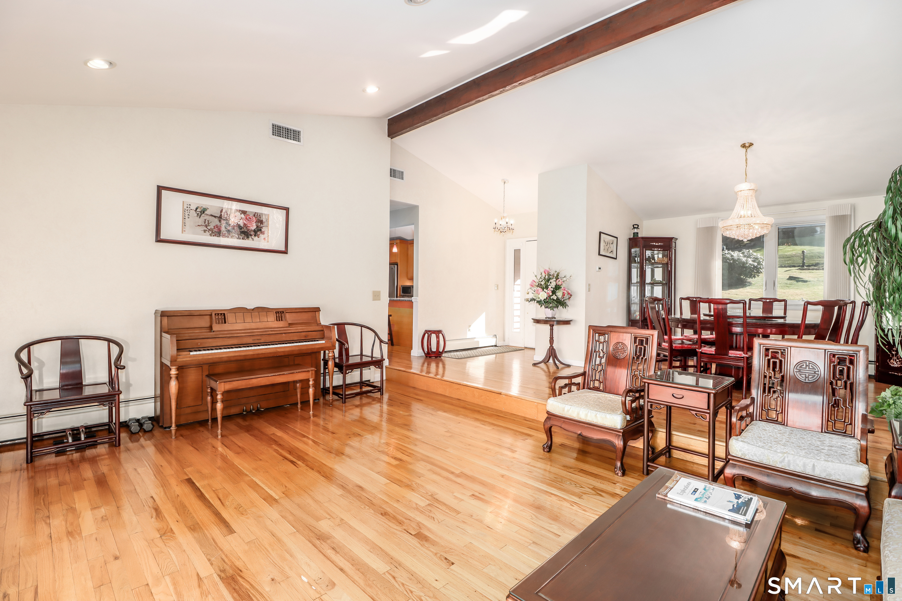 35 East Gate Road Danbury, CT 06811 - Photo 6 of 37 a living room with furniture and a wooden floor