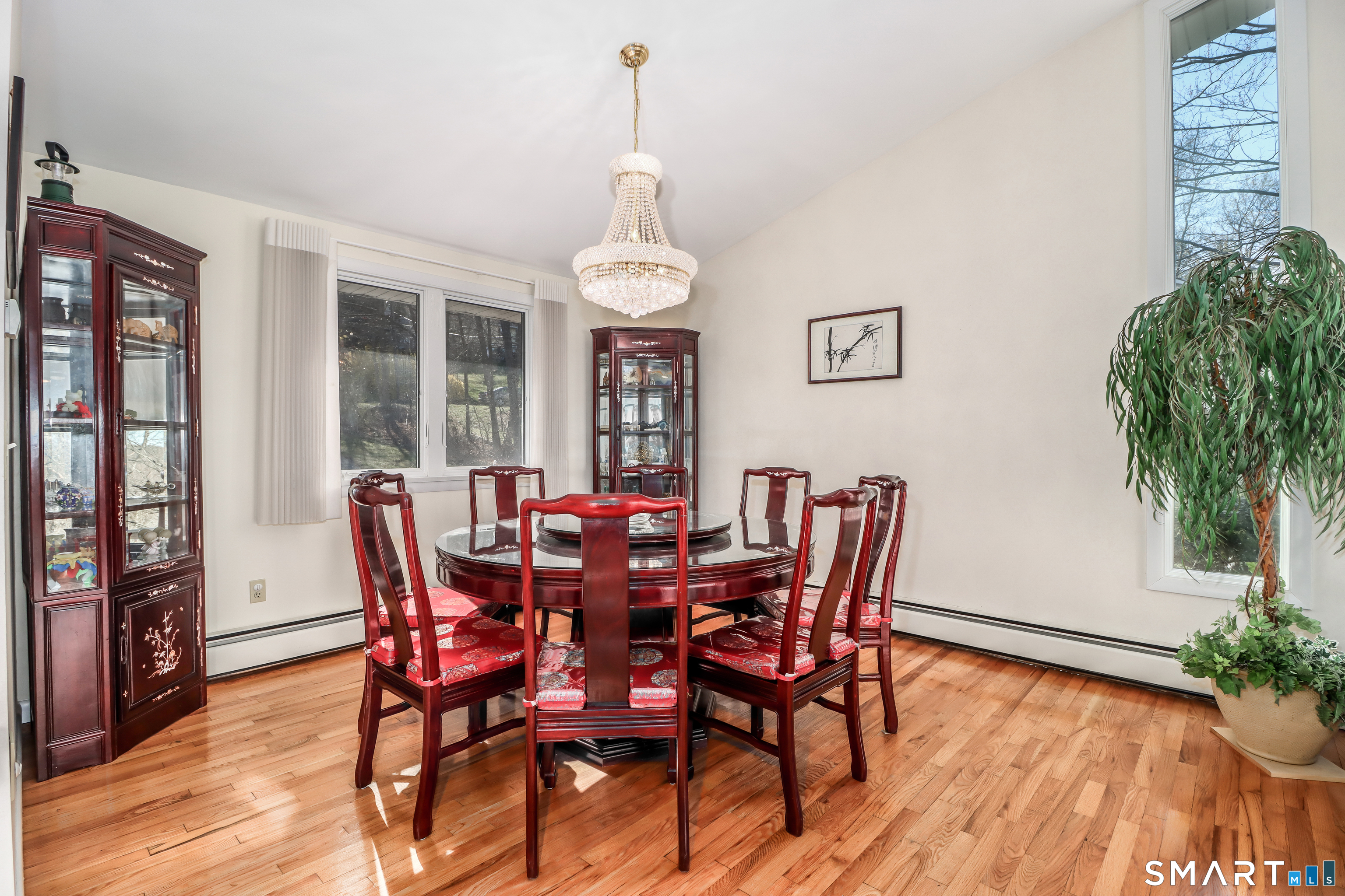 35 East Gate Road Danbury, CT 06811 - Photo 7 of 37 a view of a dining room with furniture window and wooden floor