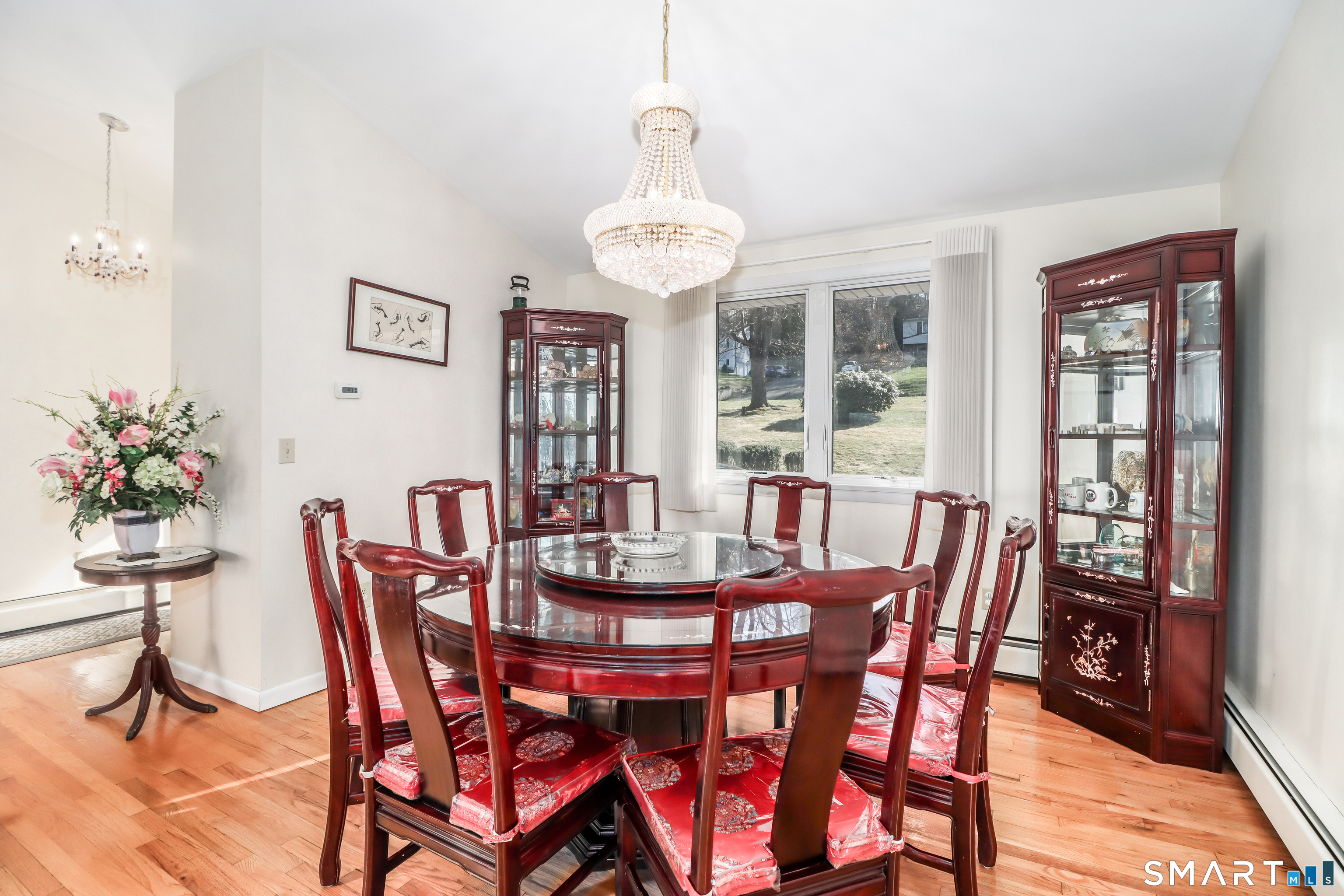 35 East Gate Road Danbury, CT 06811 - Photo 8 of 37 a view of a dining room with furniture window and wooden floor