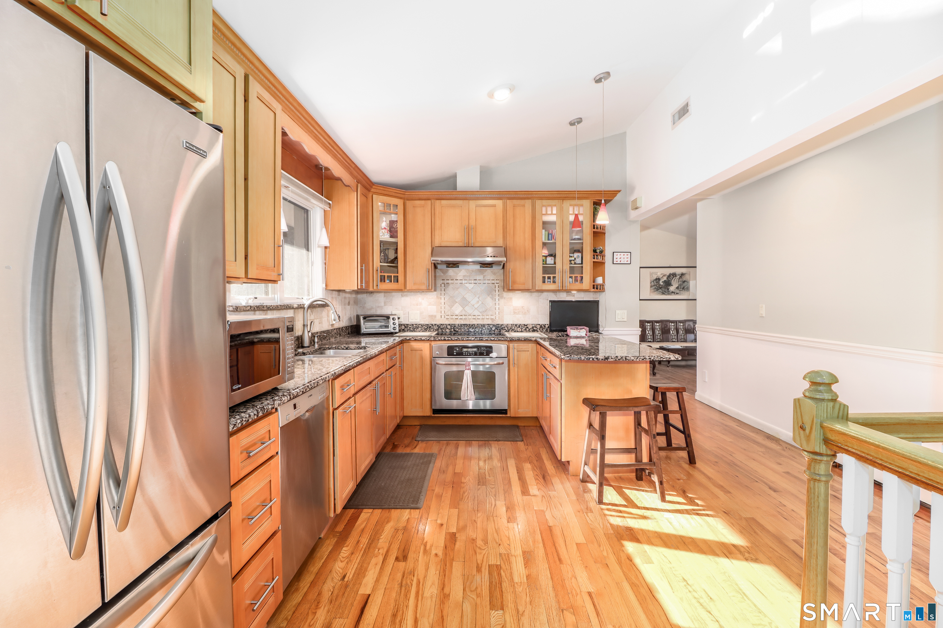 35 East Gate Road Danbury, CT 06811 - Photo 10 of 37 a kitchen with stainless steel appliances a stove a sink and a refrigerator