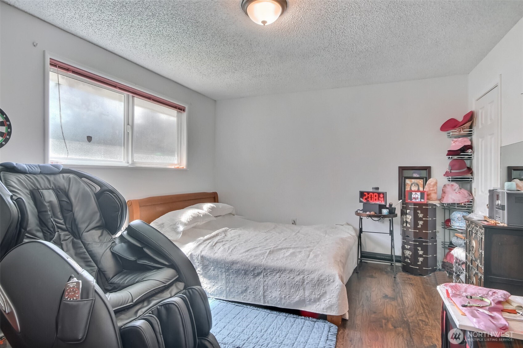 810 Southwest 356th Street Federal Way, WA 98023 - Photo 19 of 40 a bedroom with a bed and a window