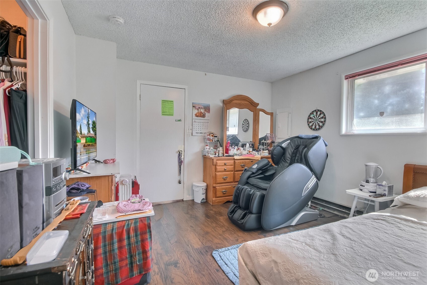 810 Southwest 356th Street Federal Way, WA 98023 - Photo 20 of 40 a living room with furniture and a flat screen tv