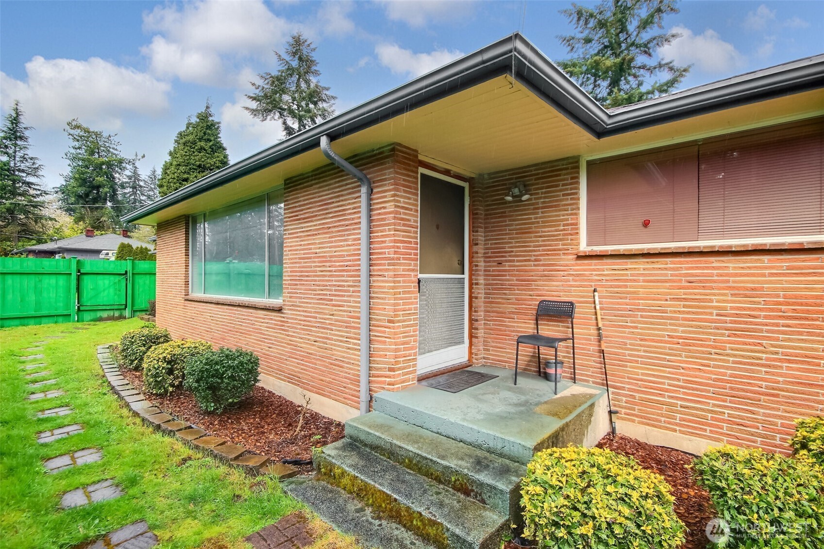 810 Southwest 356th Street Federal Way, WA 98023 - Photo 2 of 40 a view of backyard with a garden and outdoor seating
