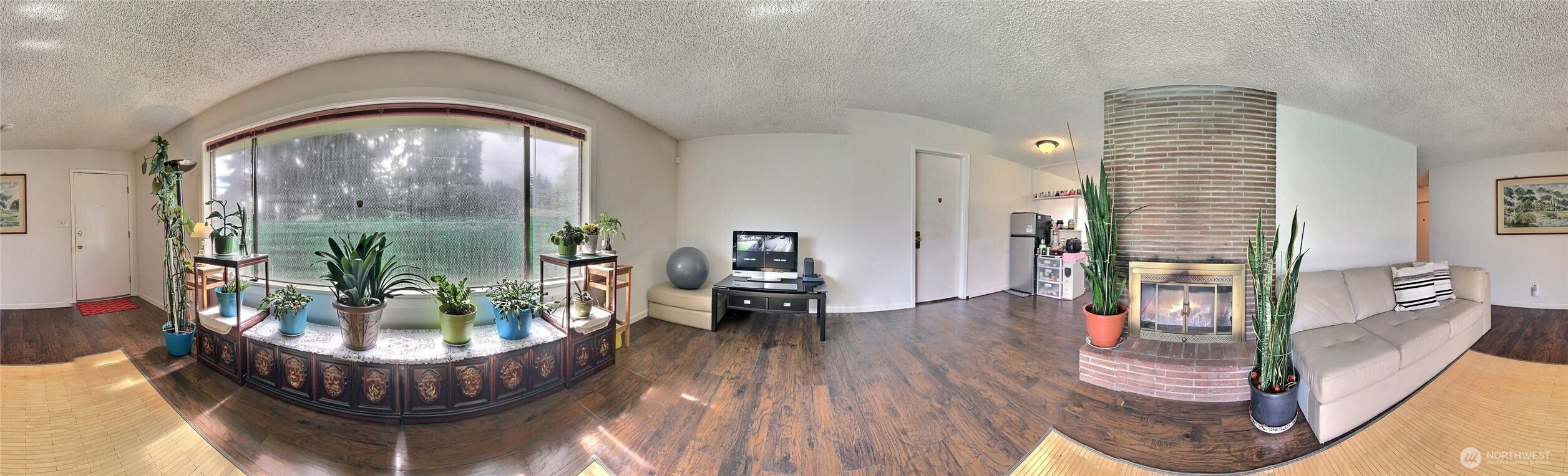 810 Southwest 356th Street Federal Way, WA 98023 - Photo 3 of 40 a living room with furniture and a wooden floor