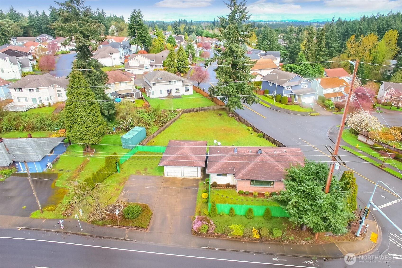 810 Southwest 356th Street Federal Way, WA 98023 - Photo 35 of 40 an aerial view of a house with a swimming pool yard and outdoor seating