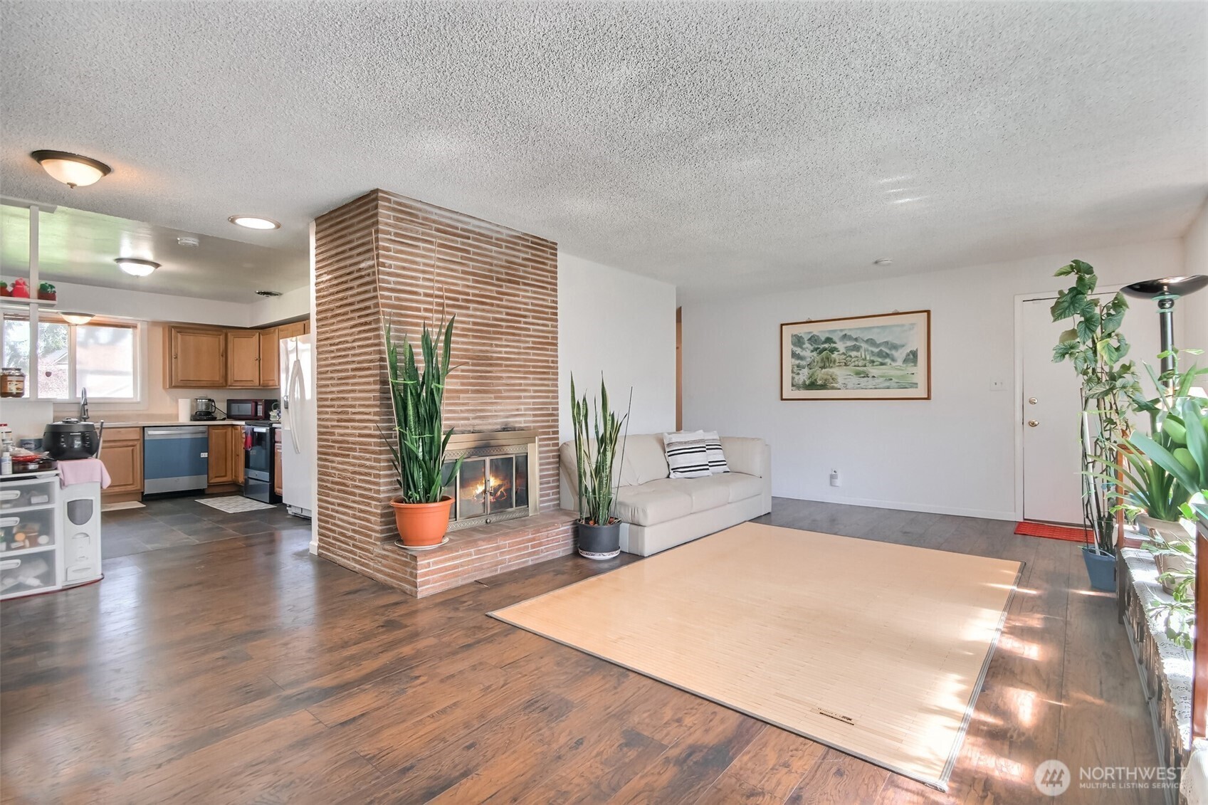 810 Southwest 356th Street Federal Way, WA 98023 - Photo 6 of 40 a living room with furniture and wooden floor