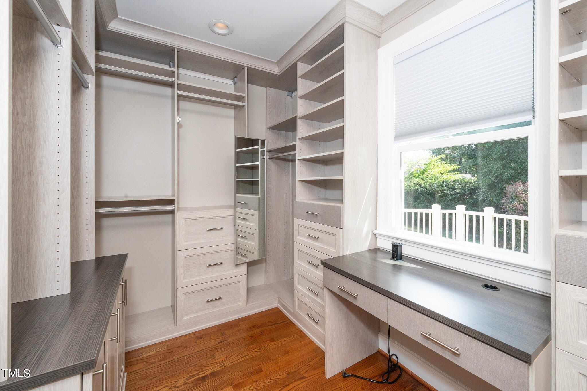 406 Brooks Avenue Raleigh, NC 27607 - Photo 23 of 33 a view of a workspace with furniture and a window
