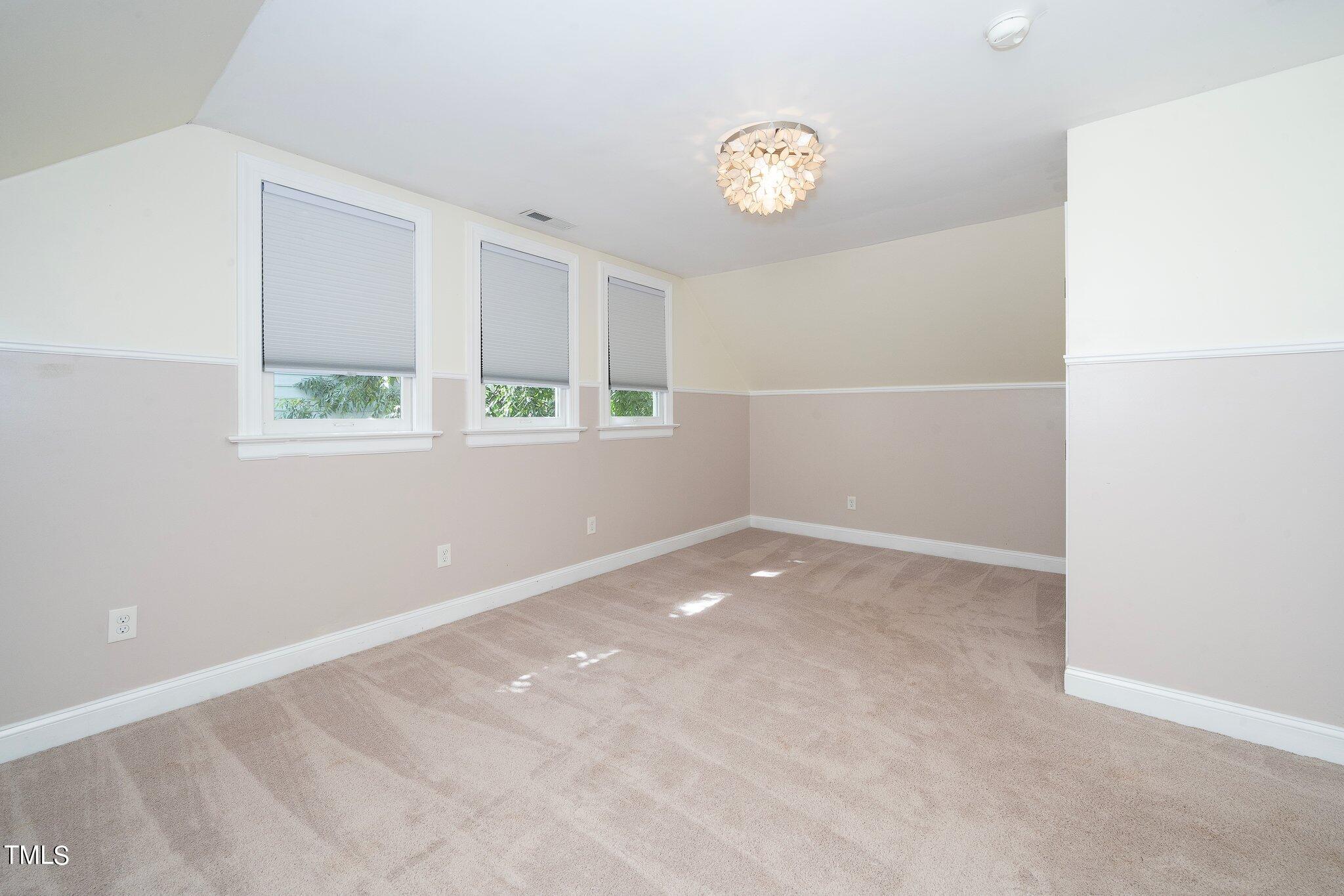 406 Brooks Avenue Raleigh, NC 27607 - Photo 25 of 33 an empty room with windows