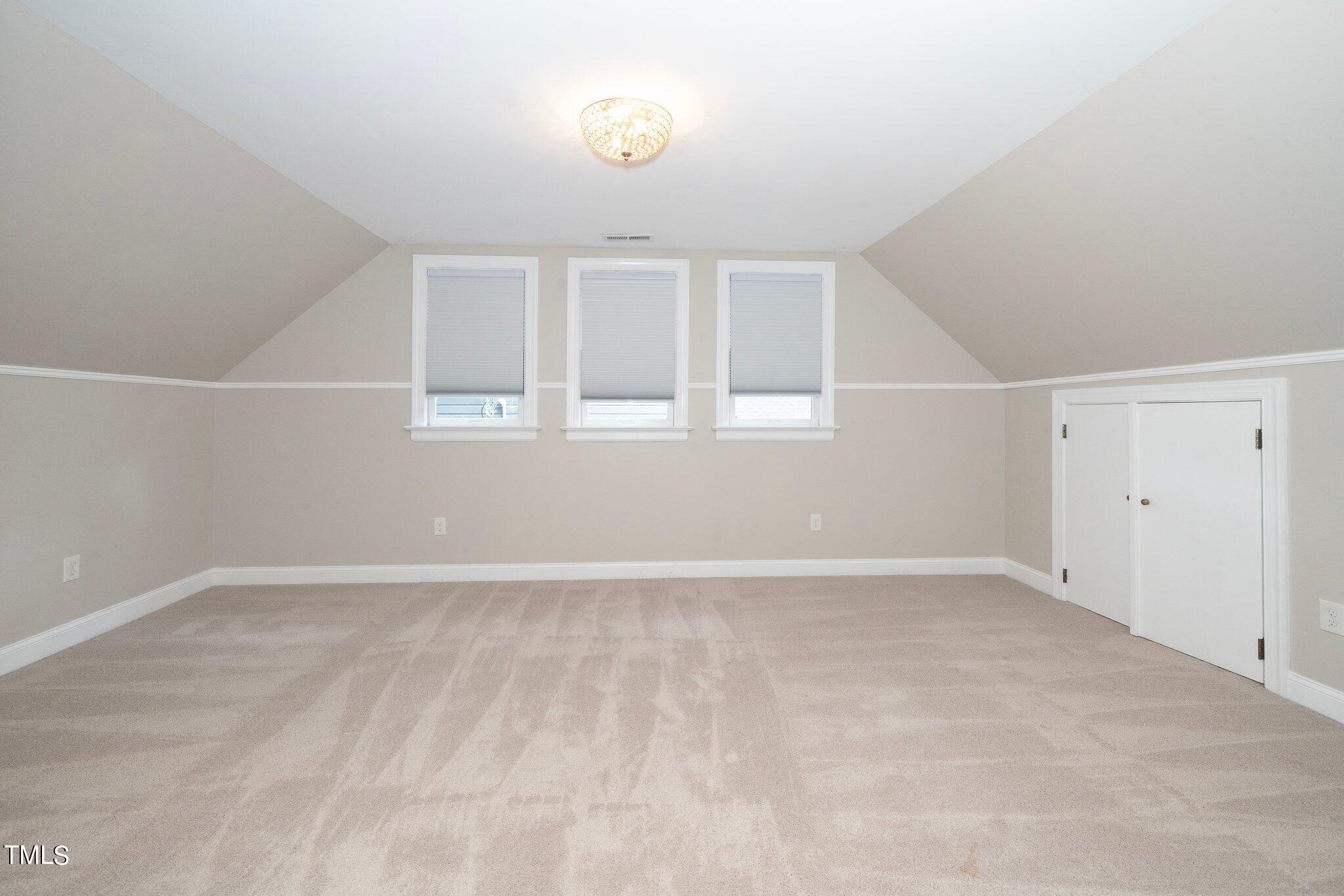 406 Brooks Avenue Raleigh, NC 27607 - Photo 27 of 33 an empty room with windows