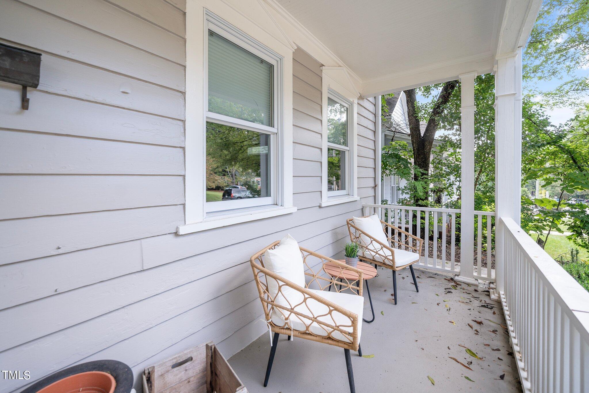 406 Brooks Avenue Raleigh, NC 27607 - Photo 4 of 33 a view of a two chairs in the balcony