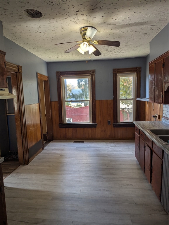 124 Fish Street Athol, MA 01331 - Photo 13 of 20 a view of an entryway with wooden floor and a window