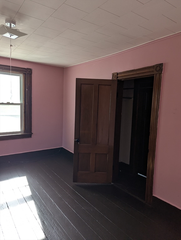 124 Fish Street Athol, MA 01331 - Photo 18 of 20 an empty room with wooden floor and windows