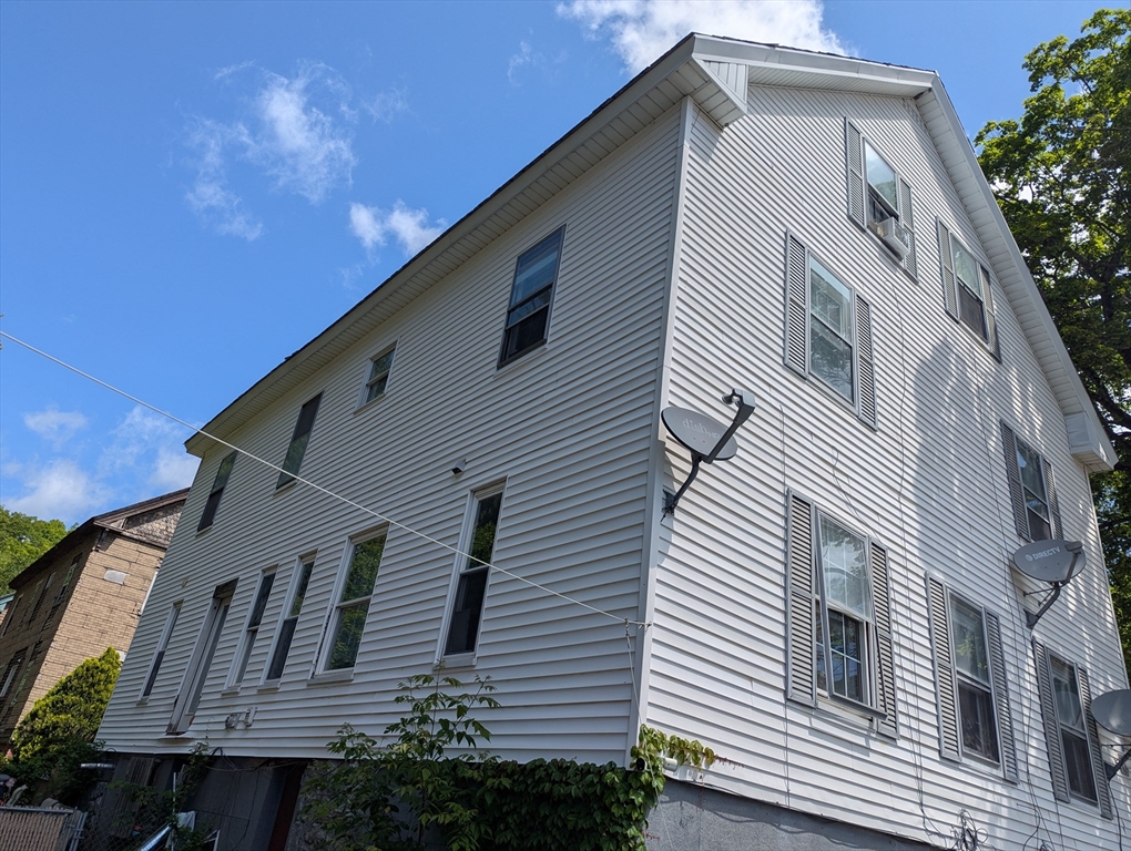 124 Fish Street Athol, MA 01331 - Photo 2 of 20 a large white building with a white roof