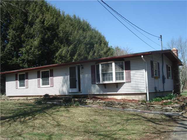 410 Jerusalem Road Windham, CT 06280 - Photo 1 of 1 a front view of a house with a yard