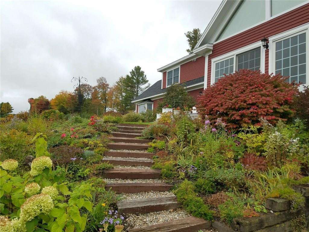 204 Paradise Road Bethel, ME 04217 - Photo 4 of 34 Gorgeous perennial gardens