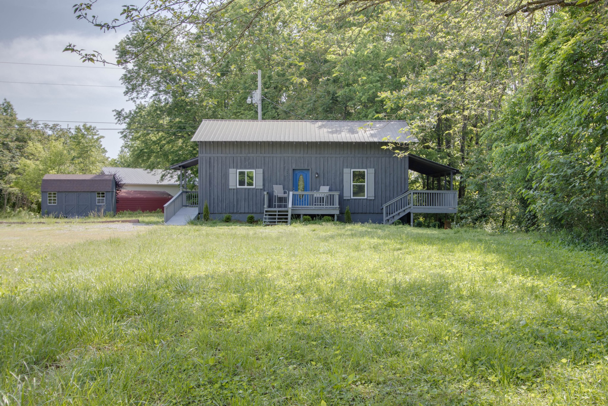424 Austin Lake Road Baxter, TN 38544 - Photo 2 of 31 front view of a house with yard
