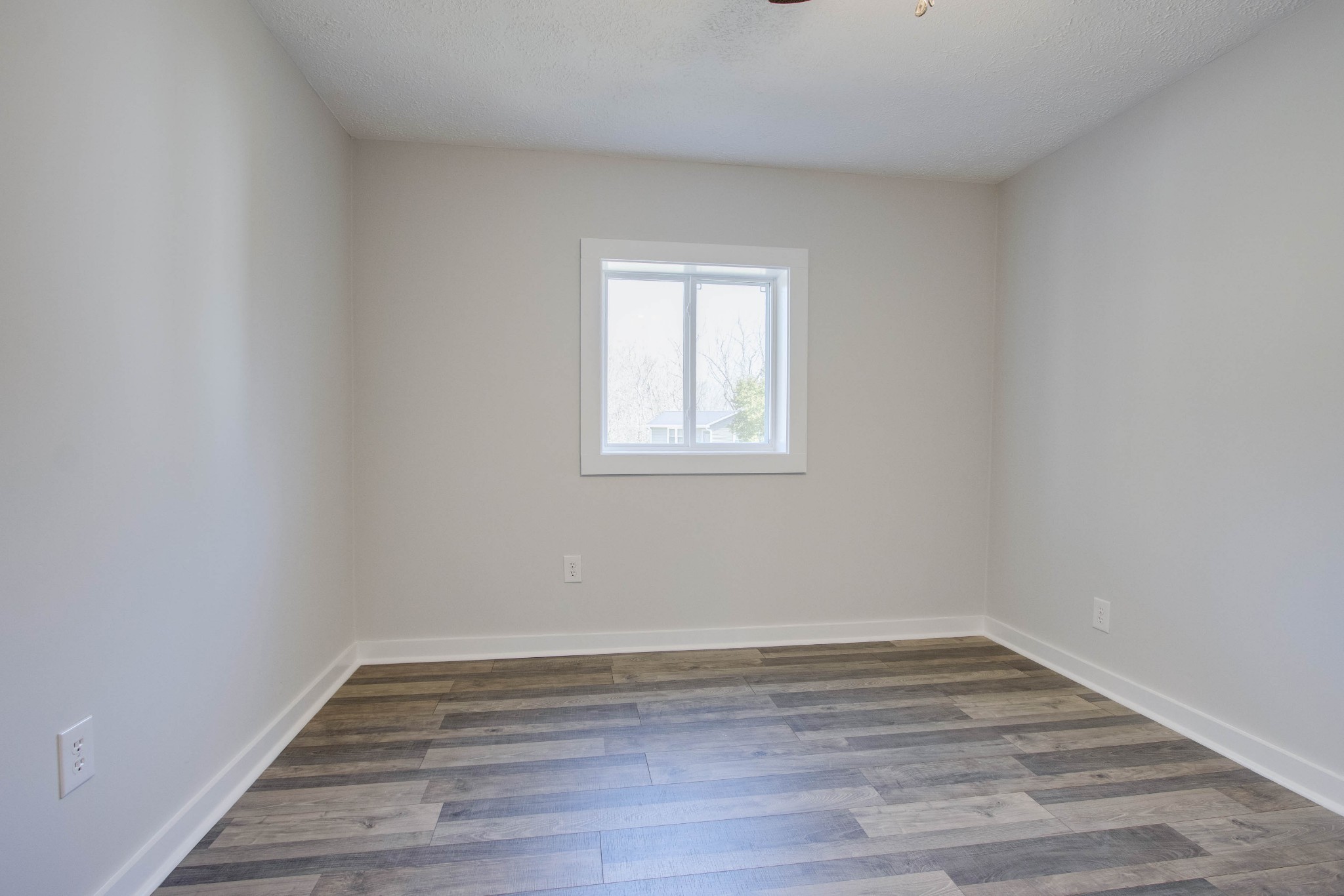 424 Austin Lake Road Baxter, TN 38544 - Photo 23 of 31 a view of a room with wooden floors and window