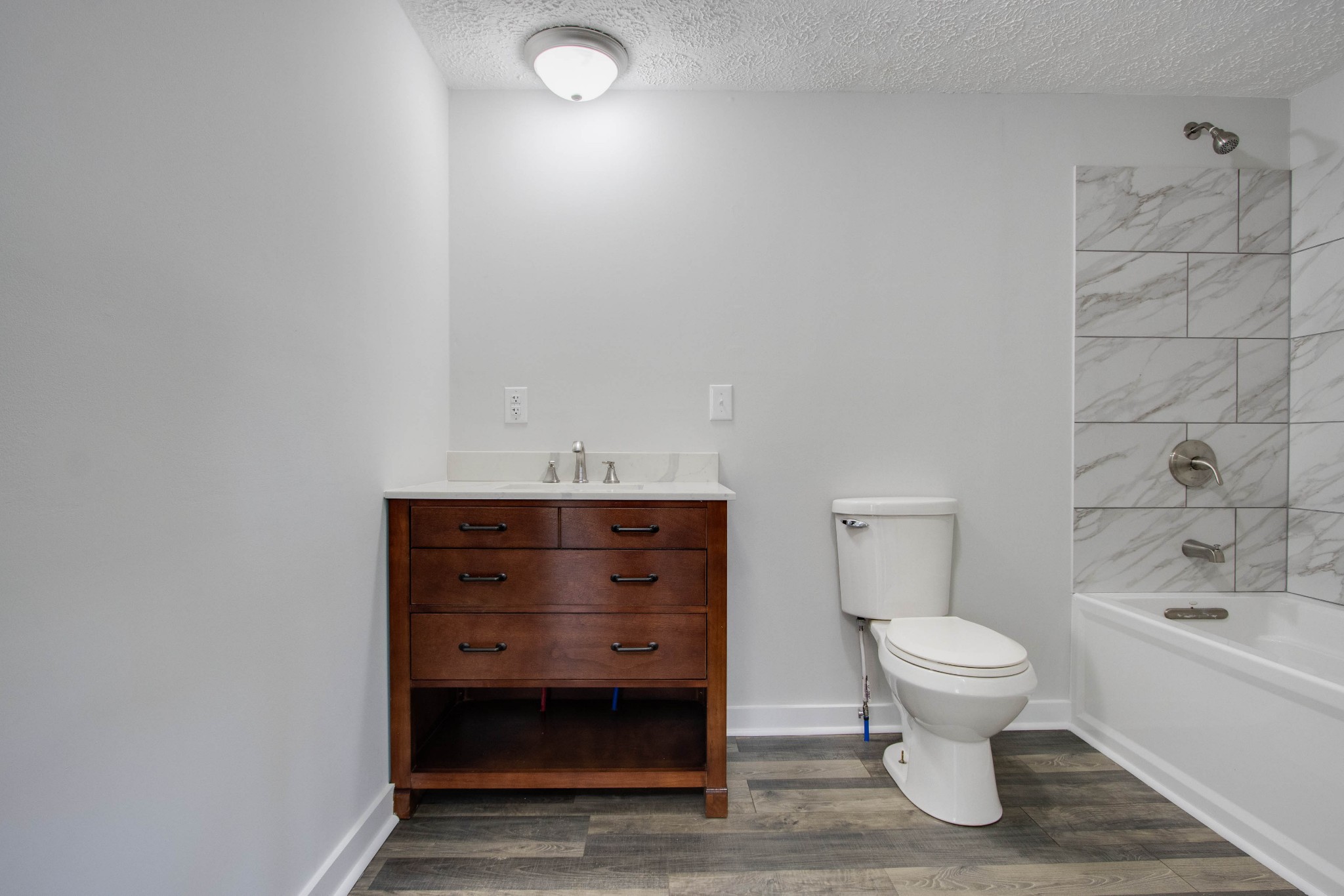 424 Austin Lake Road Baxter, TN 38544 - Photo 25 of 31 a bathroom with a sink and a toilet