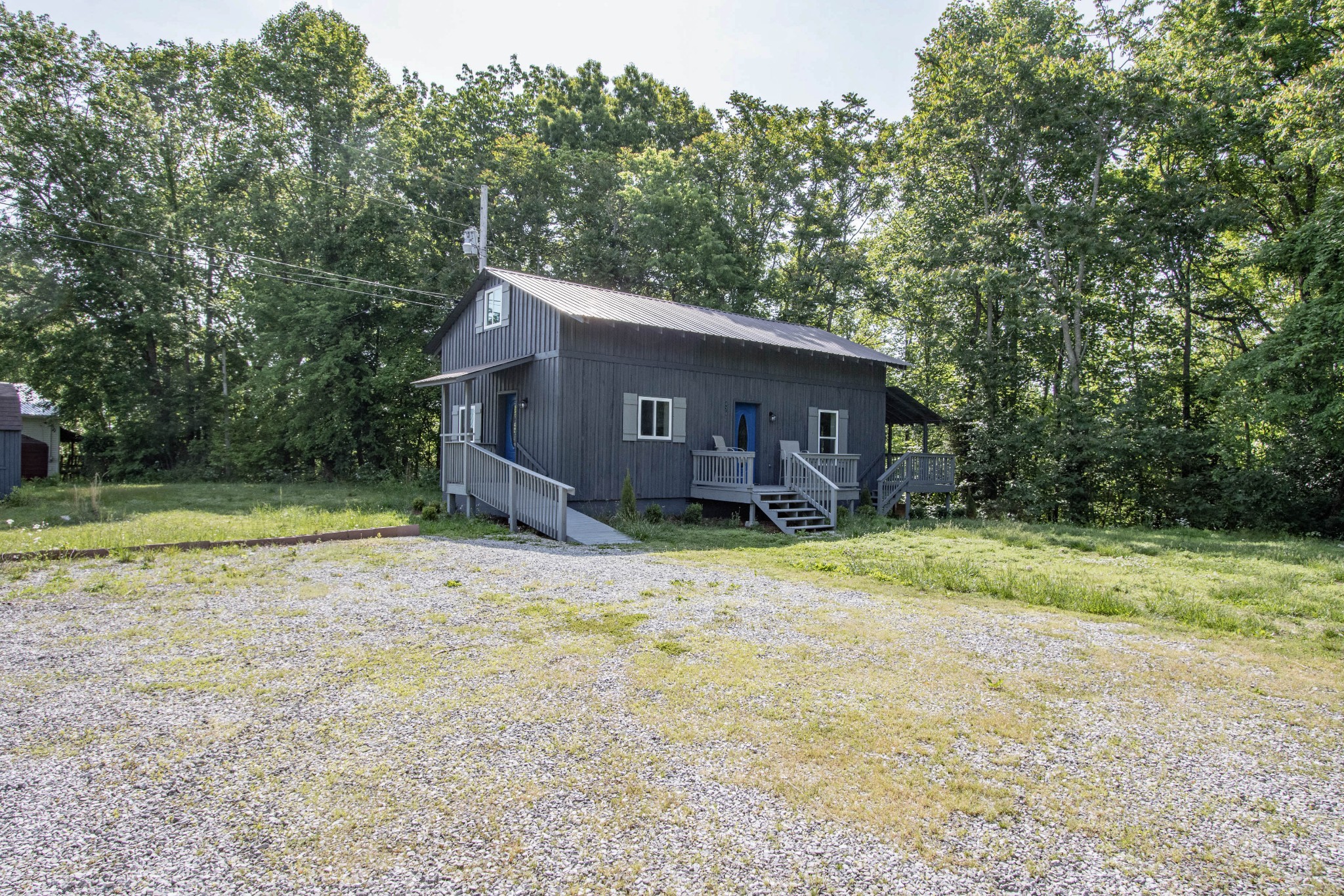 424 Austin Lake Road Baxter, TN 38544 - Photo 10 of 31 a view of a house with a yard and large tree