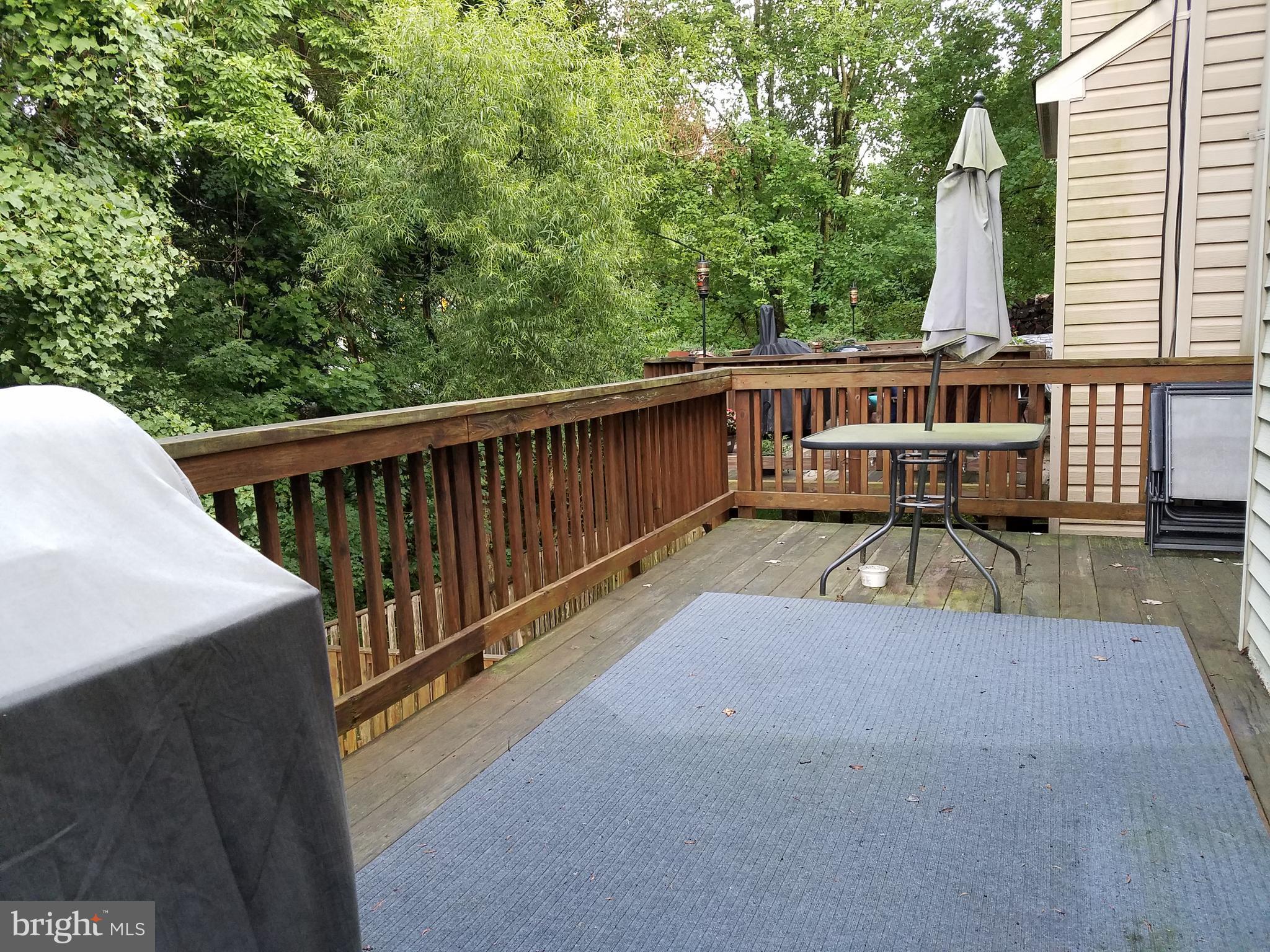 7211 Squirrel Run Court Springfield, VA 22152 - Photo 28 of 30 a view of a balcony with chairs