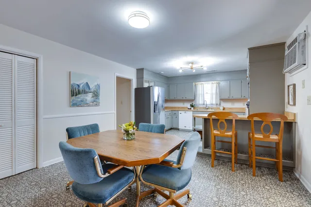 a view of a dining room with furniture