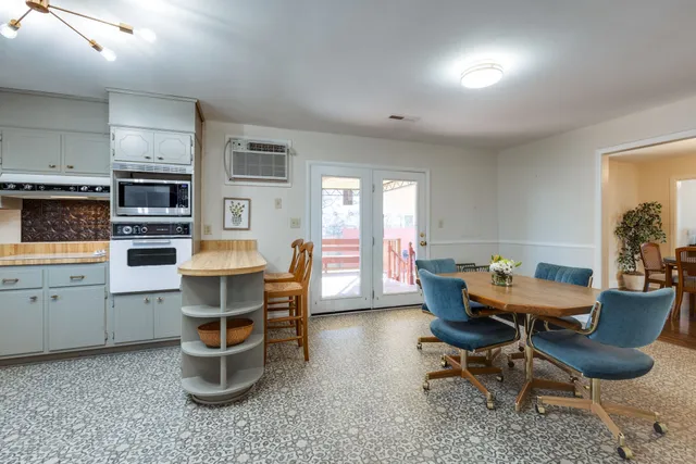 a view of a dining room with furniture