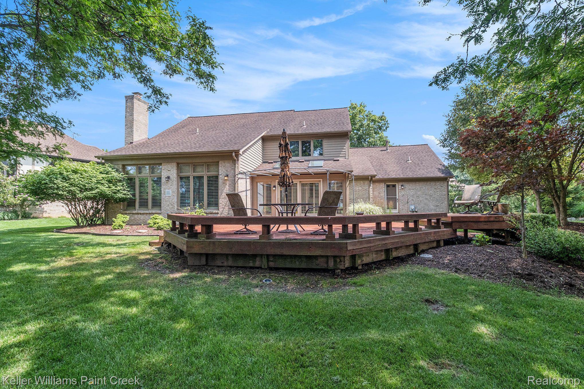 1817 Apple Ridge Court Rochester, MI 48306 - Photo 5 of 36 Large deck perfect for hosting summer gatherings.