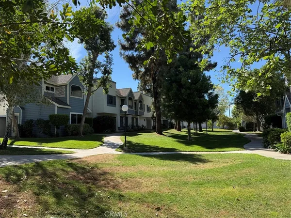a view of a house with a big yard