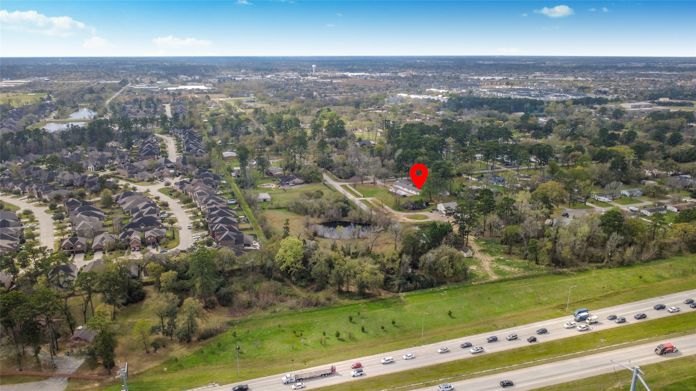 5310 Logston Lane Spring, TX 77389 - Photo 11 of 47 an aerial view of residential houses with outdoor space and trees