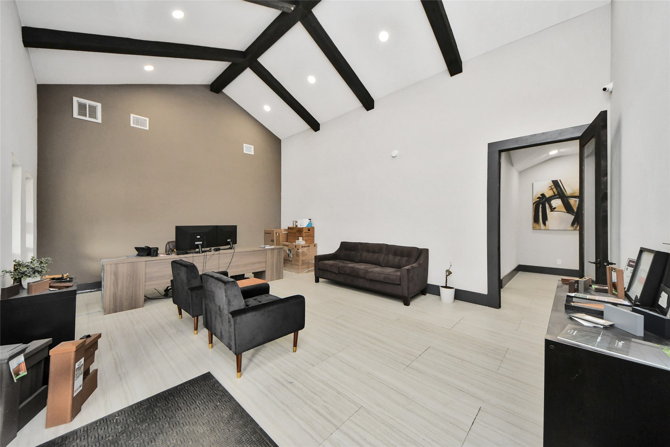 5310 Logston Lane Spring, TX 77389 - Photo 28 of 47 a living room with furniture and a flat screen tv