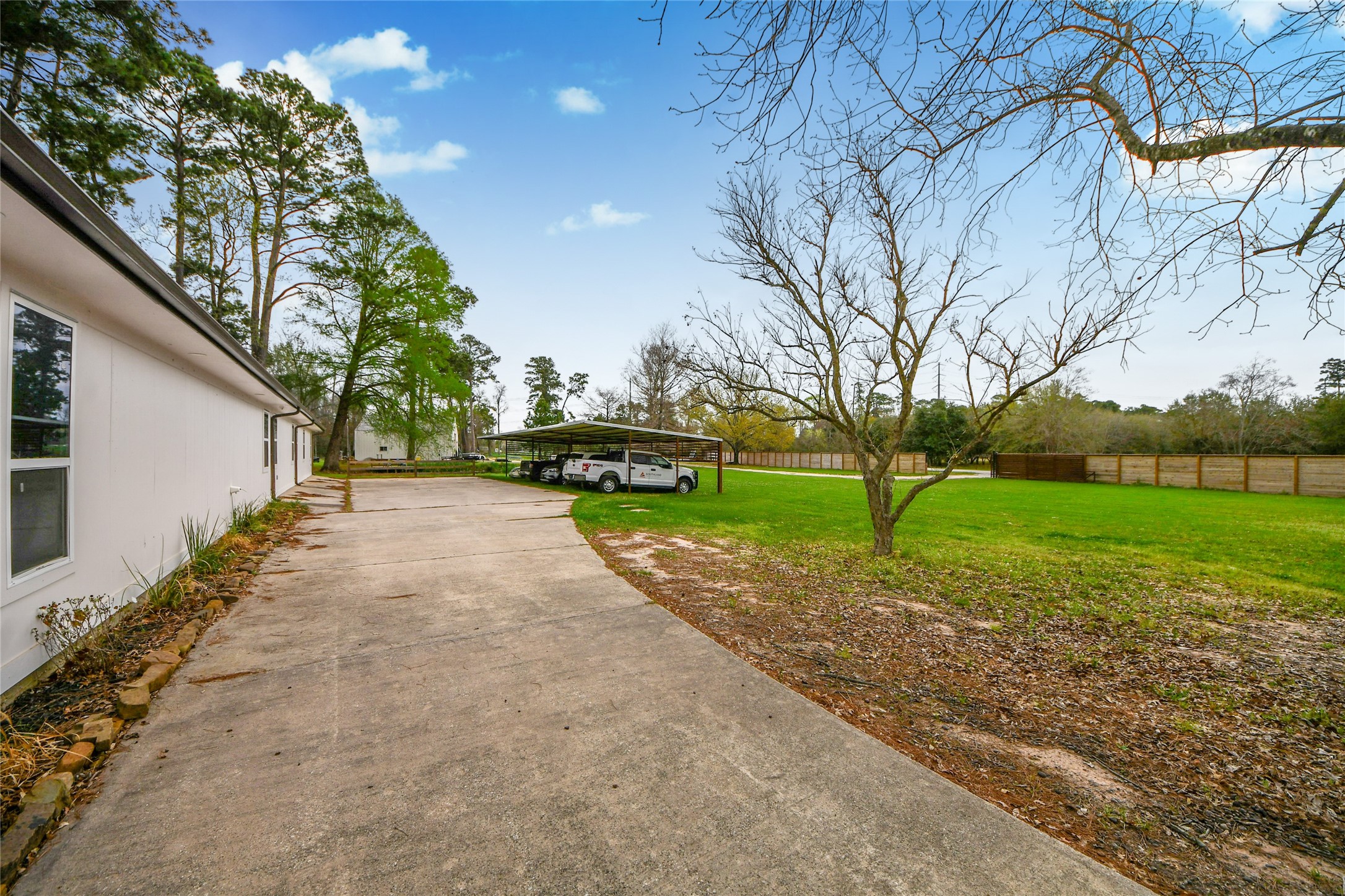 5310 Logston Lane Spring, TX 77389 - Photo 3 of 47 a view of a house with backyard and trees
