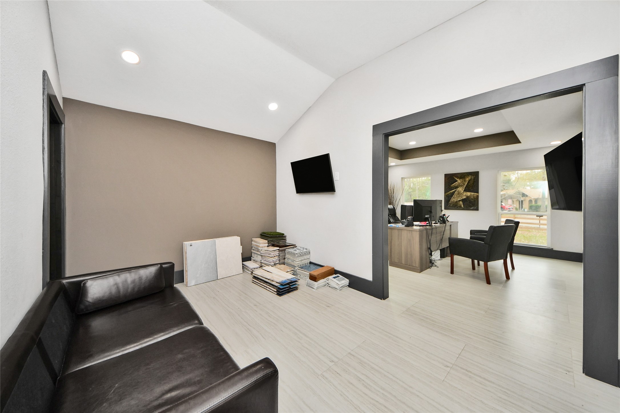 5310 Logston Lane Spring, TX 77389 - Photo 31 of 47 a living room with furniture and a flat screen tv