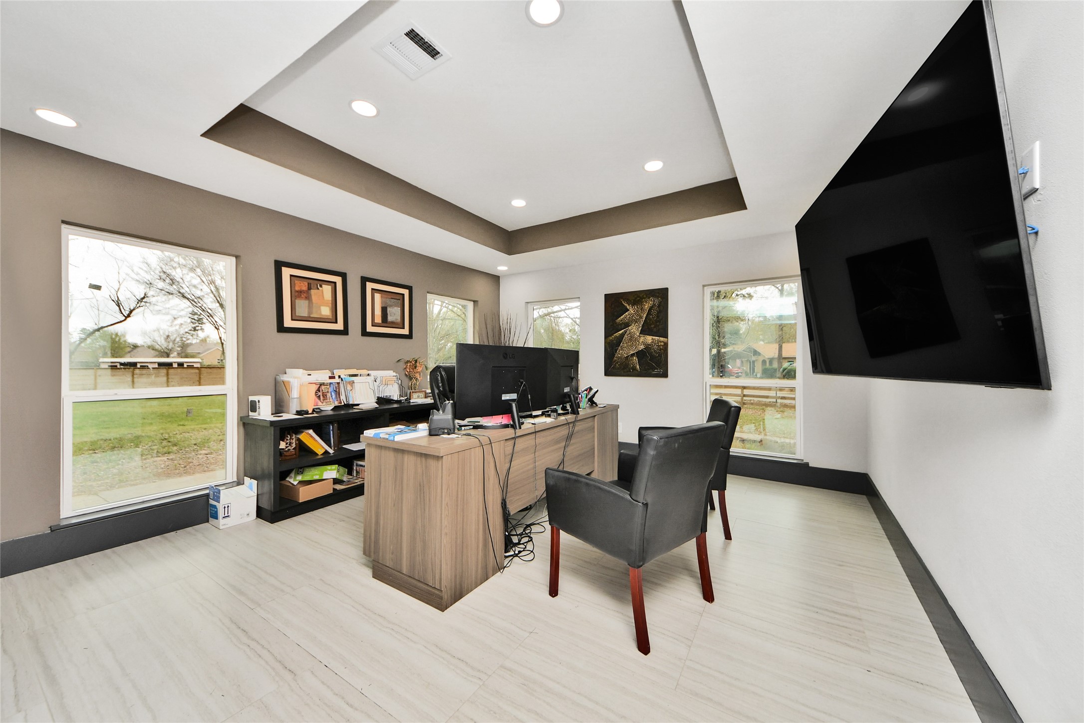 5310 Logston Lane Spring, TX 77389 - Photo 32 of 47 a living room with furniture a flat screen tv and a large window
