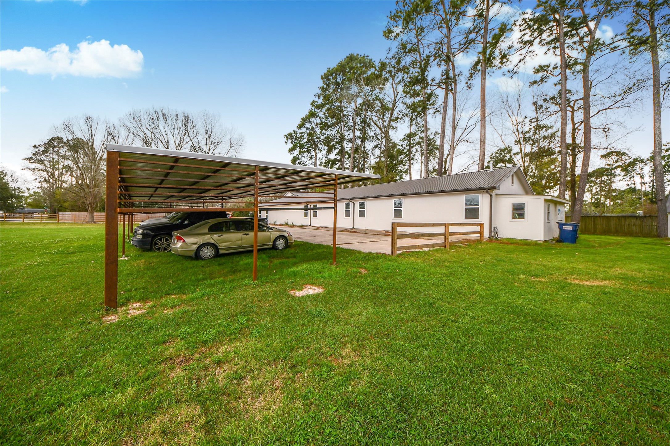 5310 Logston Lane Spring, TX 77389 - Photo 4 of 47 a view of a house with a back yard
