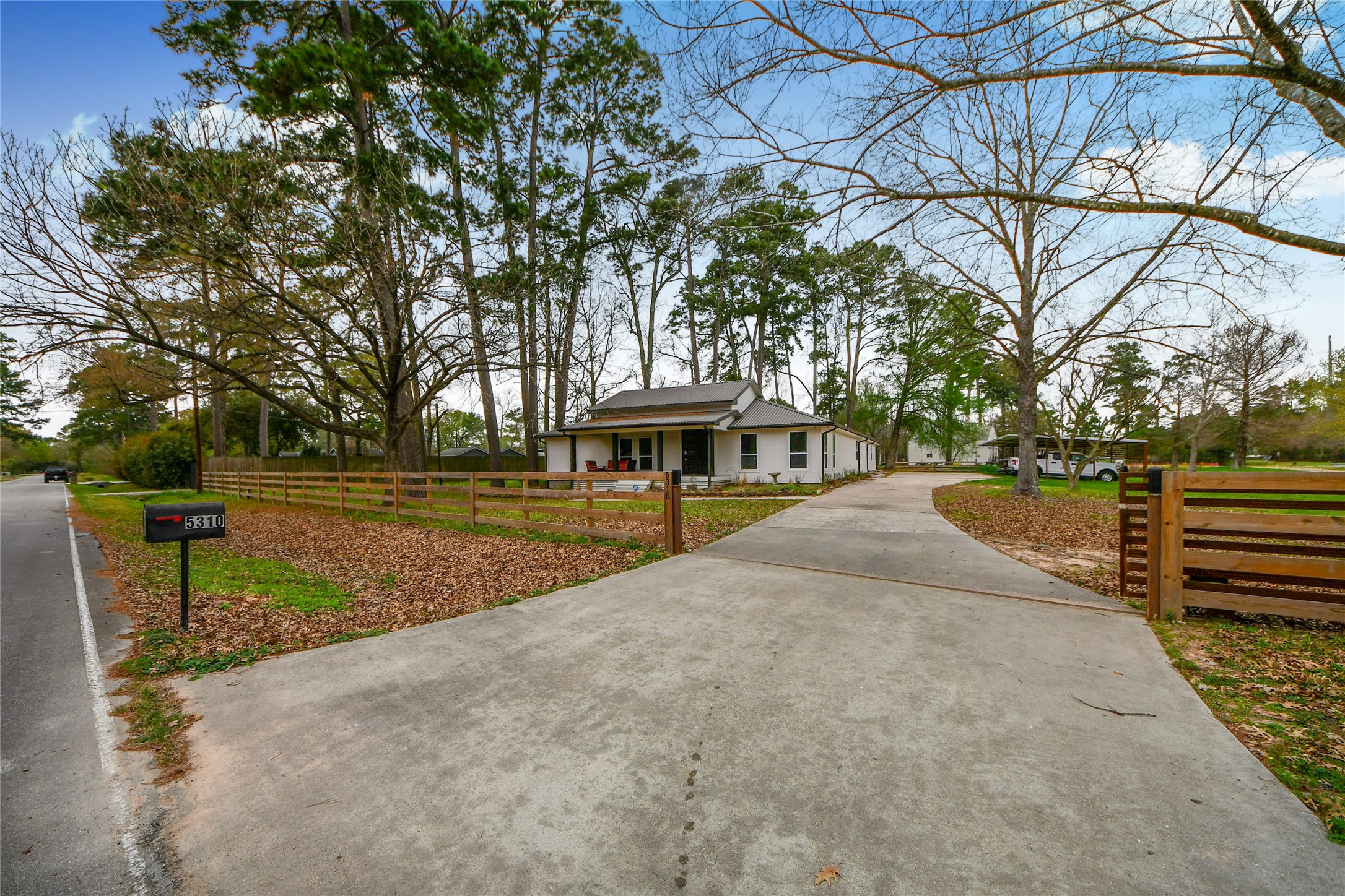 5310 Logston Lane Spring, TX 77389 - Photo 45 of 47 a view of outdoor space with deck and trees