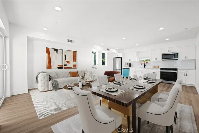 a view of a dining room with furniture