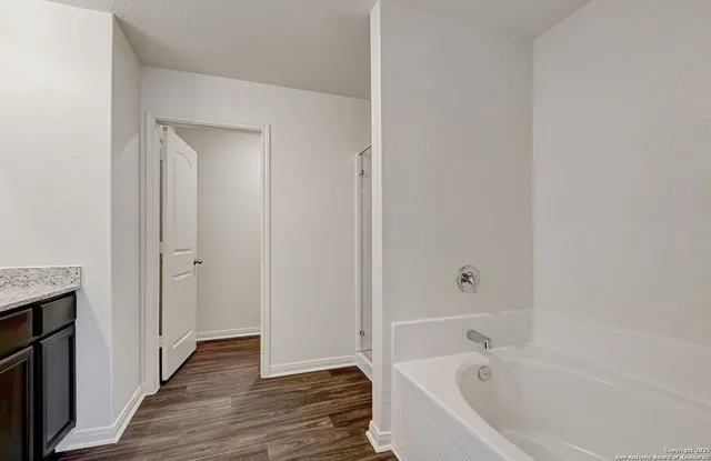 a bathroom with a bathtub