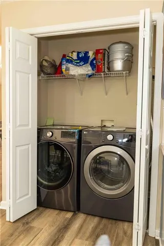 a utility room with dryer and washer