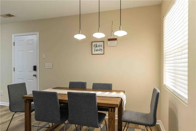 a view of a dining room with furniture