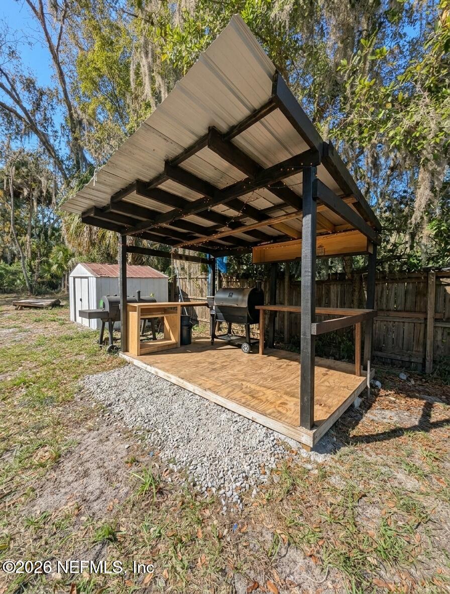 1124 South 12th Street Palatka, FL 32177 - Photo 18 of 19 Outdoor kitchen, small shed