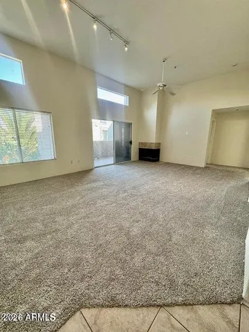 an empty room with windows