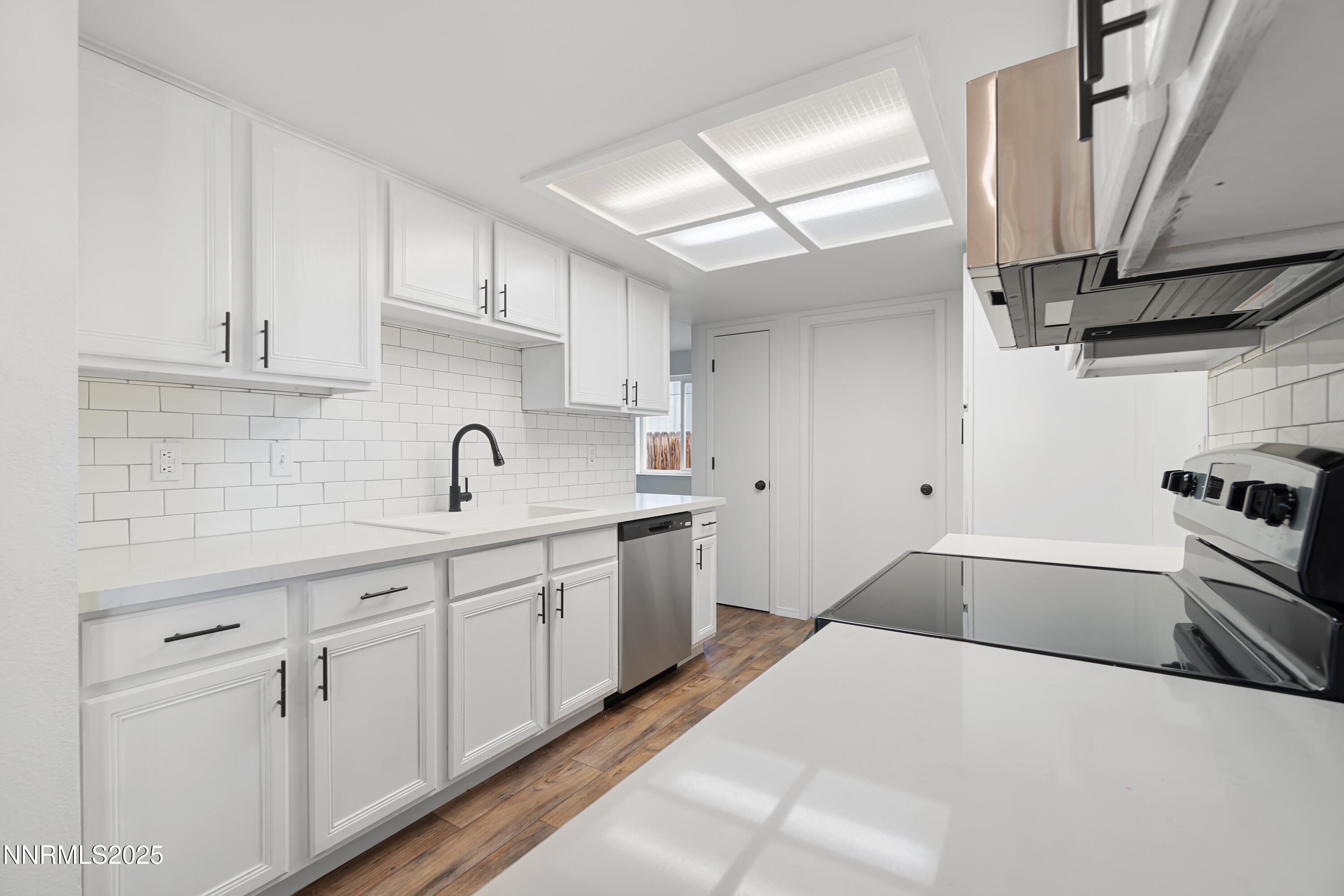 365 Kathy Street Fallon, NV 89406 - Photo 11 of 28 a kitchen with granite countertop a sink stainless steel appliances and cabinets